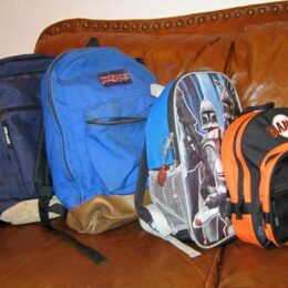 backpacks on sofa