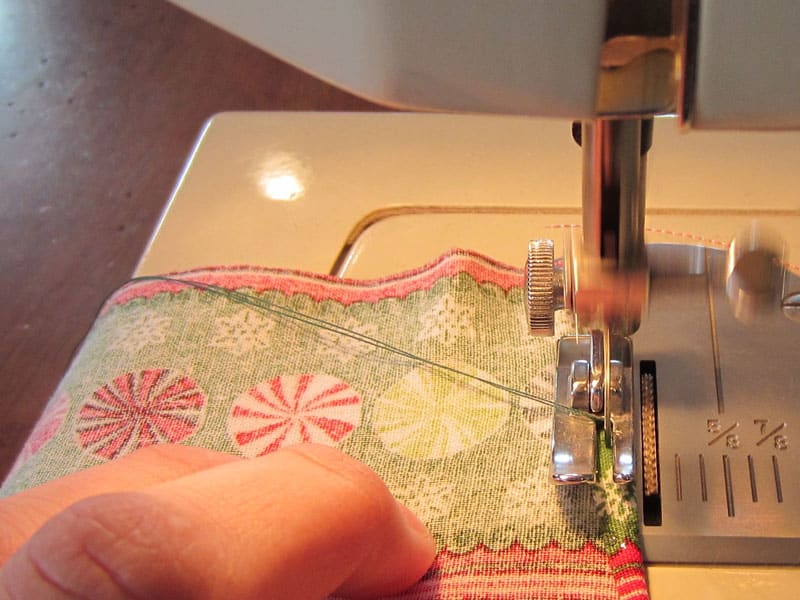 fabric going through sewing machine