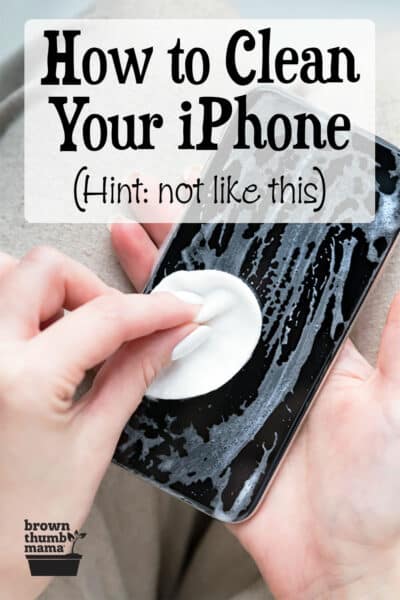 hands scrubbing iphone with soapy pad