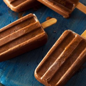 chocolate fudge pops on blue wood