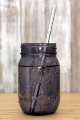 mason jar with metal straw