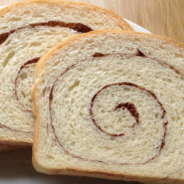 closeup of slices of cinnamon swirl bread on plate