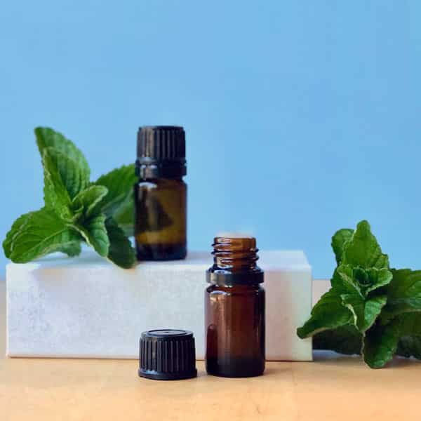 essential oil bottles on white box