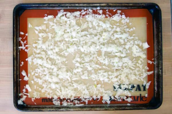 cookie sheet with chopped onions