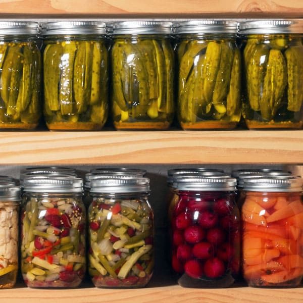 rows of home canned food in jars