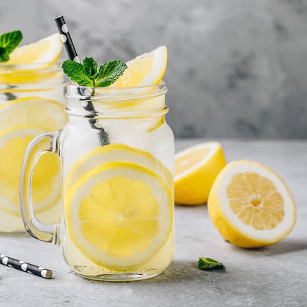 This delicious, homemade lemonade recipe is a burst of tart and sweet flavors--without corn syrup, artificial flavors, or dyes. A family favorite!