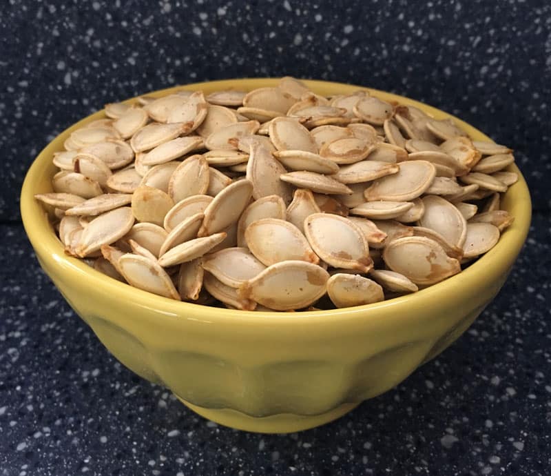 Whether you grow pumpkins in your garden or carve them for Halloween, this recipe for easy roasted pumpkin seeds makes a crunchy, nutritious snack.