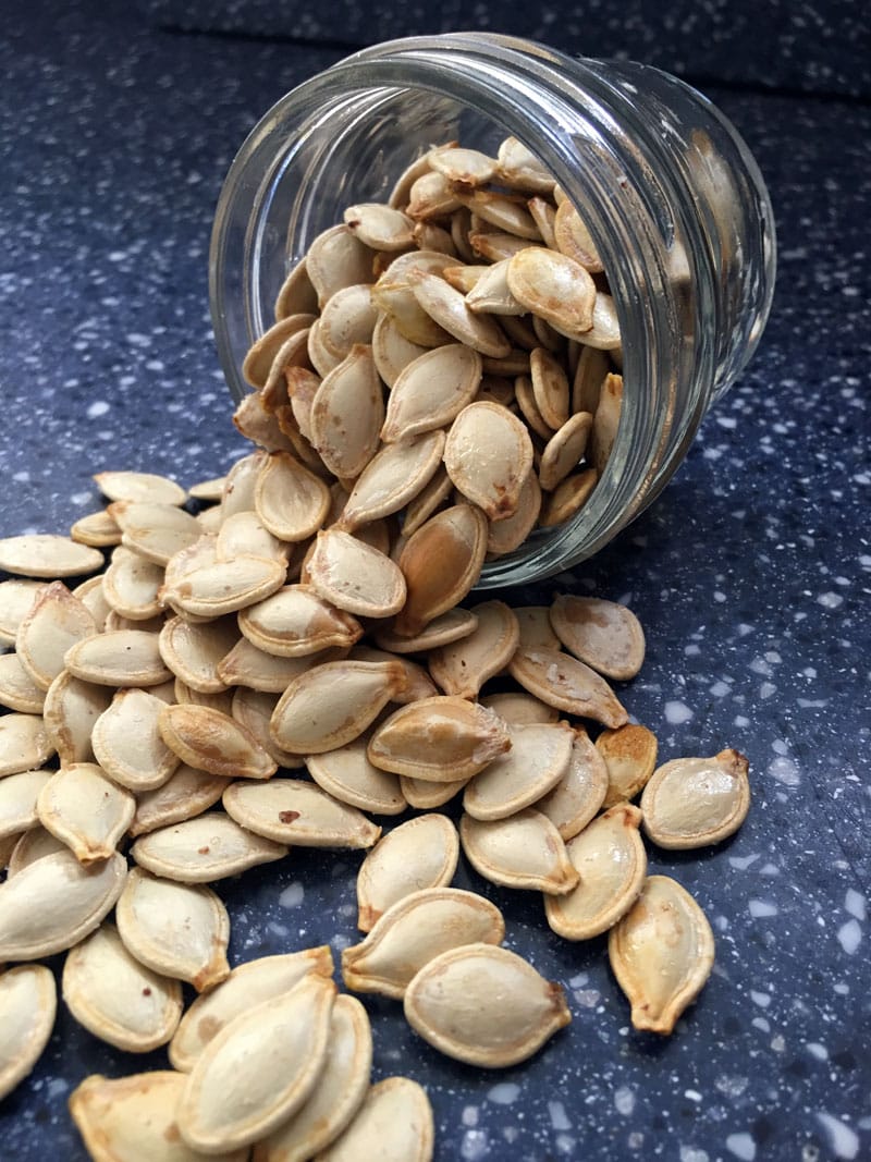 Whether you grow pumpkins in your garden or carve them for Halloween, this recipe for easy roasted pumpkin seeds makes a crunchy, nutritious snack.