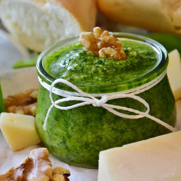Homemade garlic and basil pesto is so easy to make! Use basil and garlic from your garden for the best flavor.