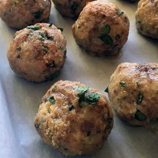 baked meatballs on tray