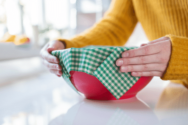 beeswax food wrap on red bowl