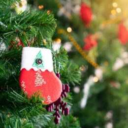 tiny christmas stocking hanging on tree
