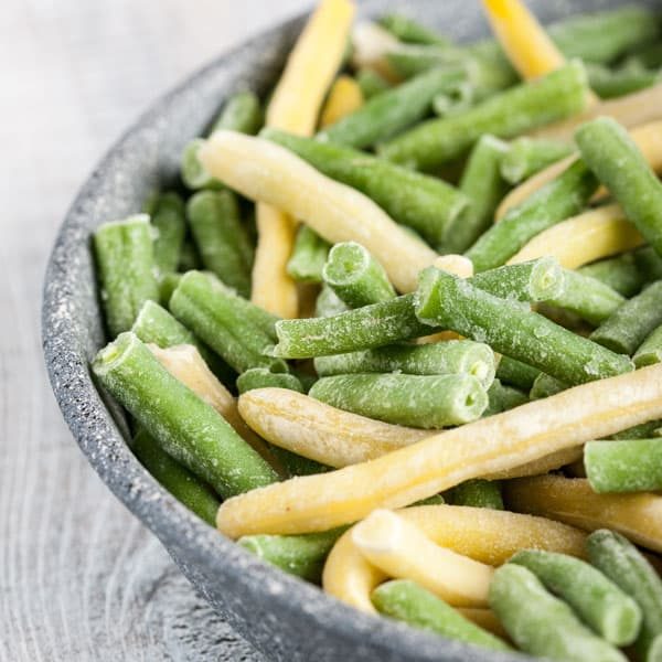 frozen green and yellow beans in bowl