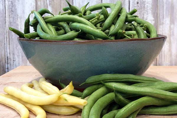 yellow and green beans in bowl