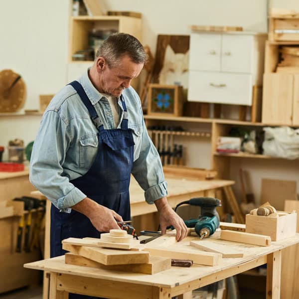 man working in wood shop
