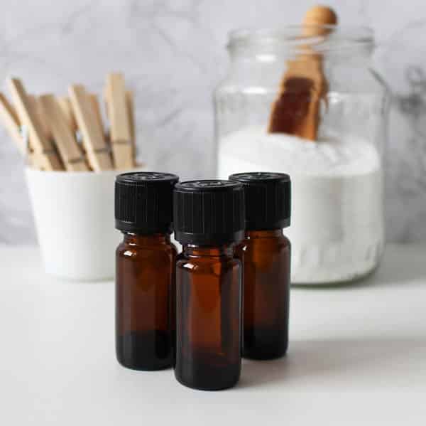 essential oils and baking soda on table