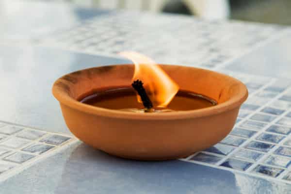 candle burning on table