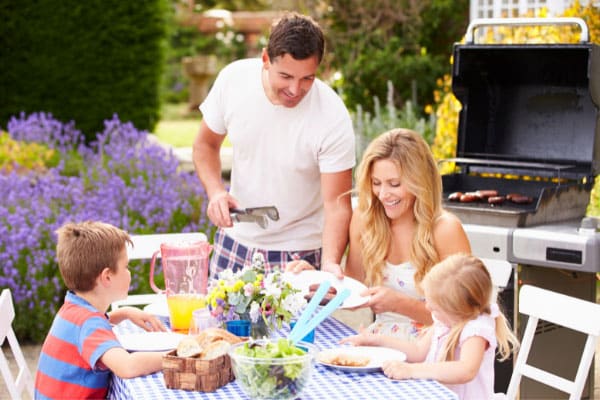 family having lunch outside