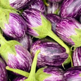 pile of white and purple striped eggplant