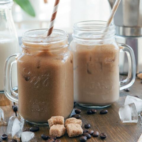 glasses of iced coffee with straws