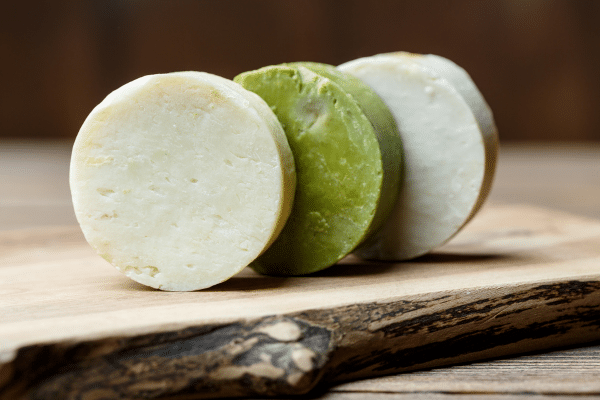 round soaps on wood board